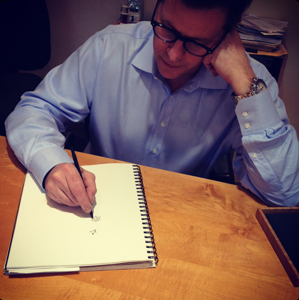 Christopher Duquet sketching a custom jewelry design in his studio Evanston Illinois