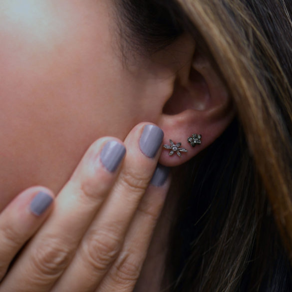 Wild Lily Petite Fleur Diamond Earrings on ear