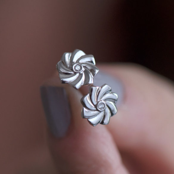 Japanese Pinwheel Petite Fleur Diamond Earrings hand held pair alt view