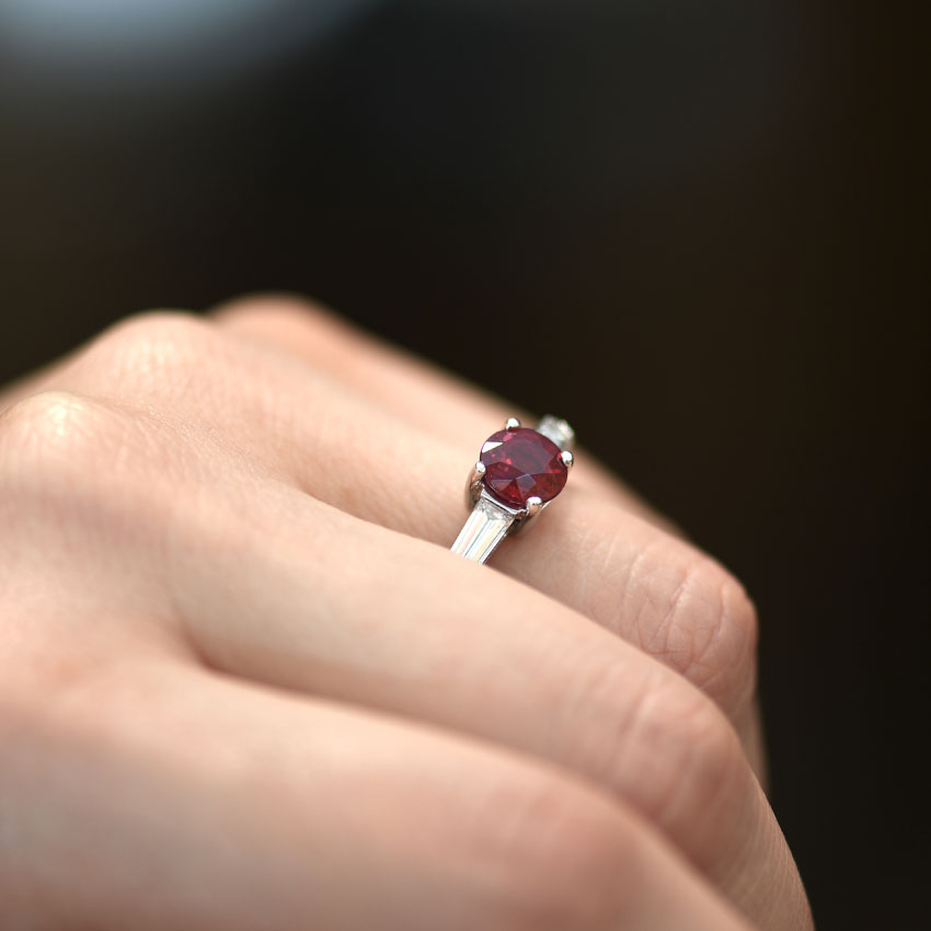 Round Brilliant Ruby Ring with Diamond Bullets Christopher Duquet Hand View
