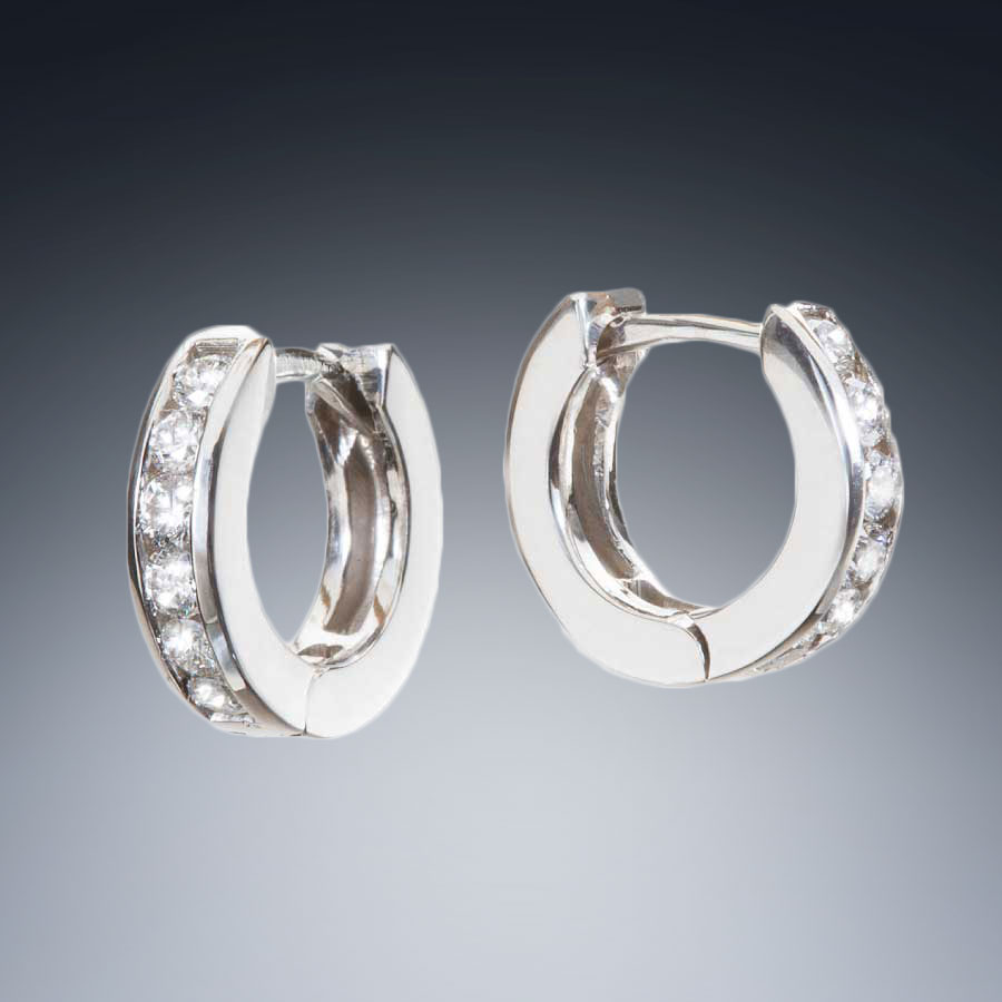Channel Set Diamond Hoops Designer Earrings by Christopher Duquet background