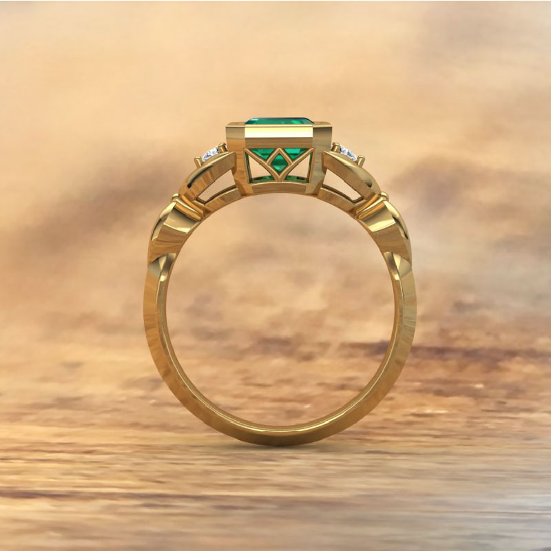 Custom Made Emerald and diamond ring in yellow gold