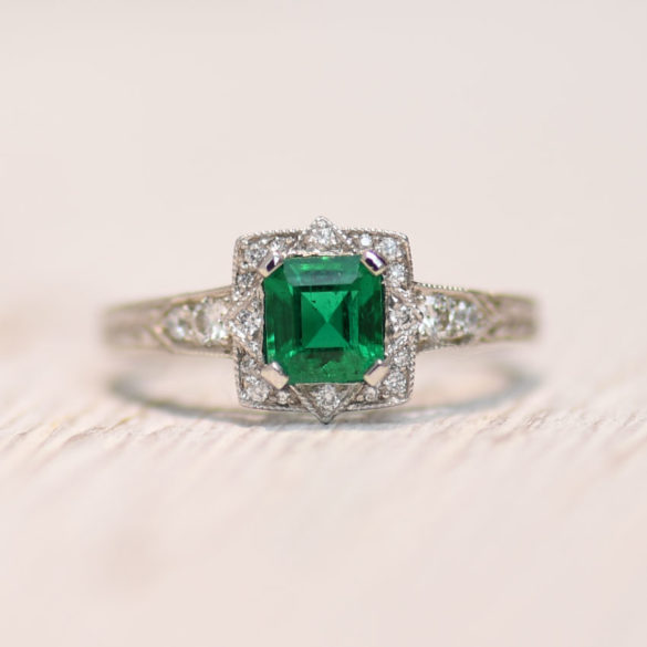 Square Cut Emerald With a Double Diamond Halo in White-Gold