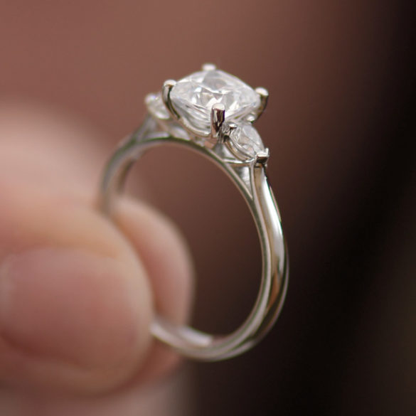Cushion Shaped Diamond Engagement Ring With Pear Shaped Diamond Accents