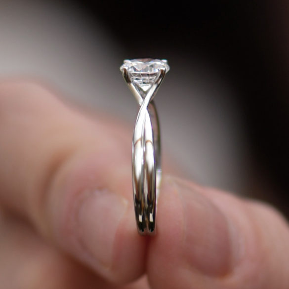 Round Cut Solitaire Diamond Engagement Ring With a Twisted Band