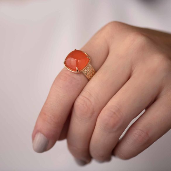 Orange Chalcedony Gold Ring with Vintage Tuck and Roll Design on hand