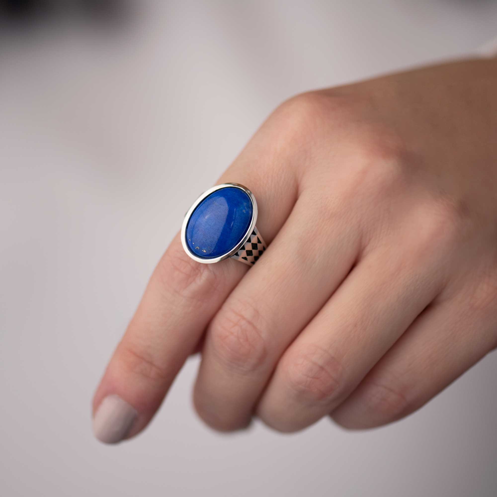 Oval Lapis Lazuli Harlequin Band White Gold on hand