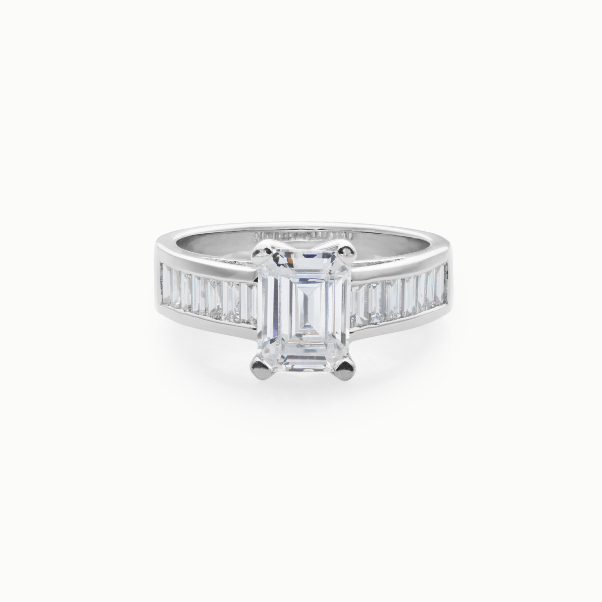 emerald cut diamond engagement ring with channel set baguettes