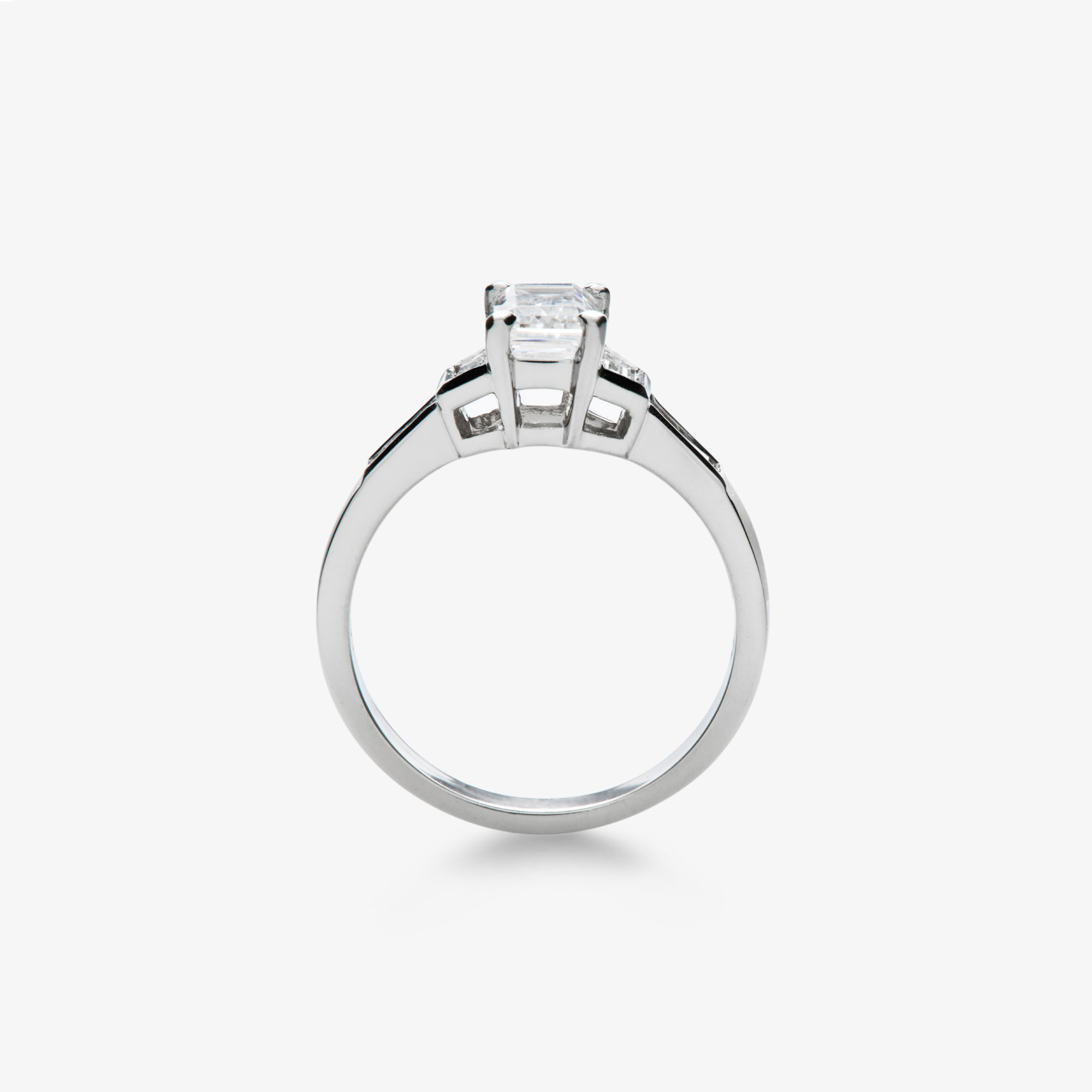 emerald cut trapezoid and straight baguette diamond engagement ring alt view