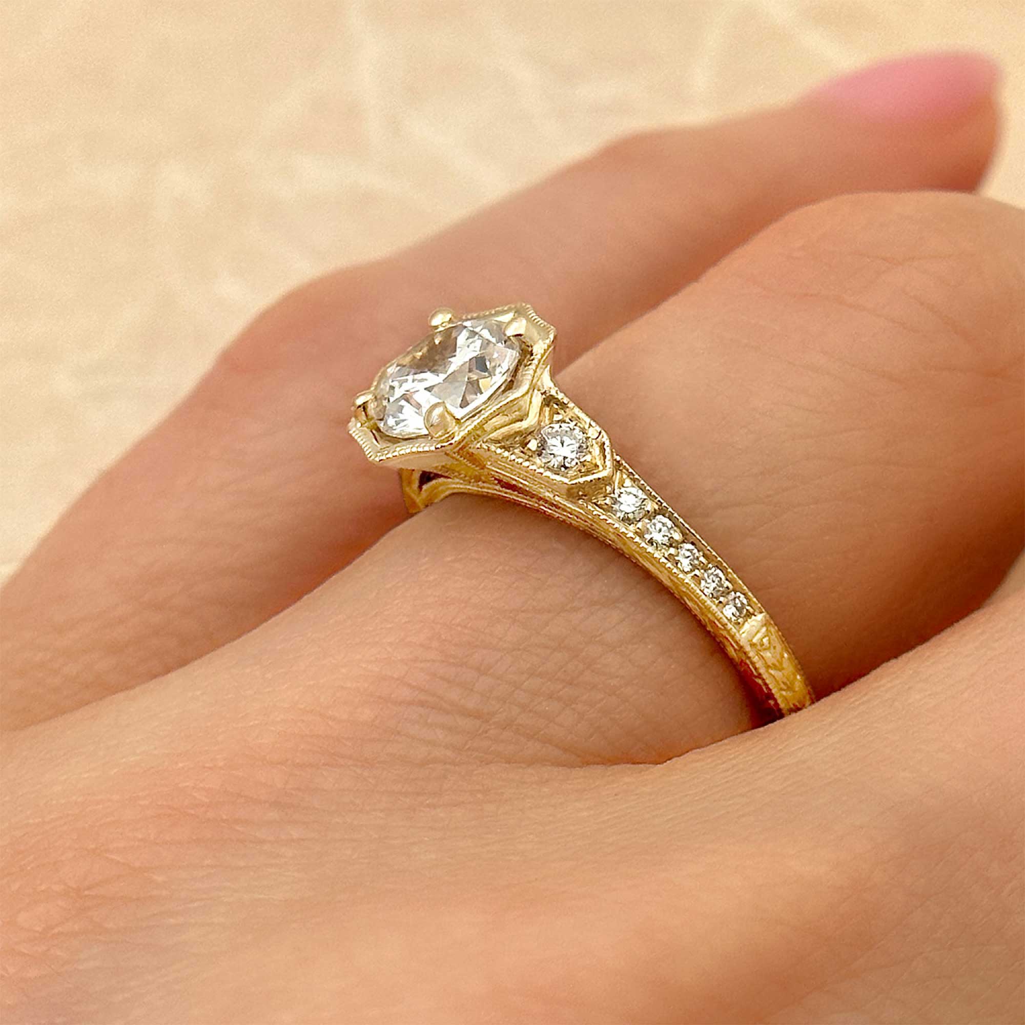 hand engraved round Brilliant diamond vintage engagement ring with halo and stepped band yellow gold alt view