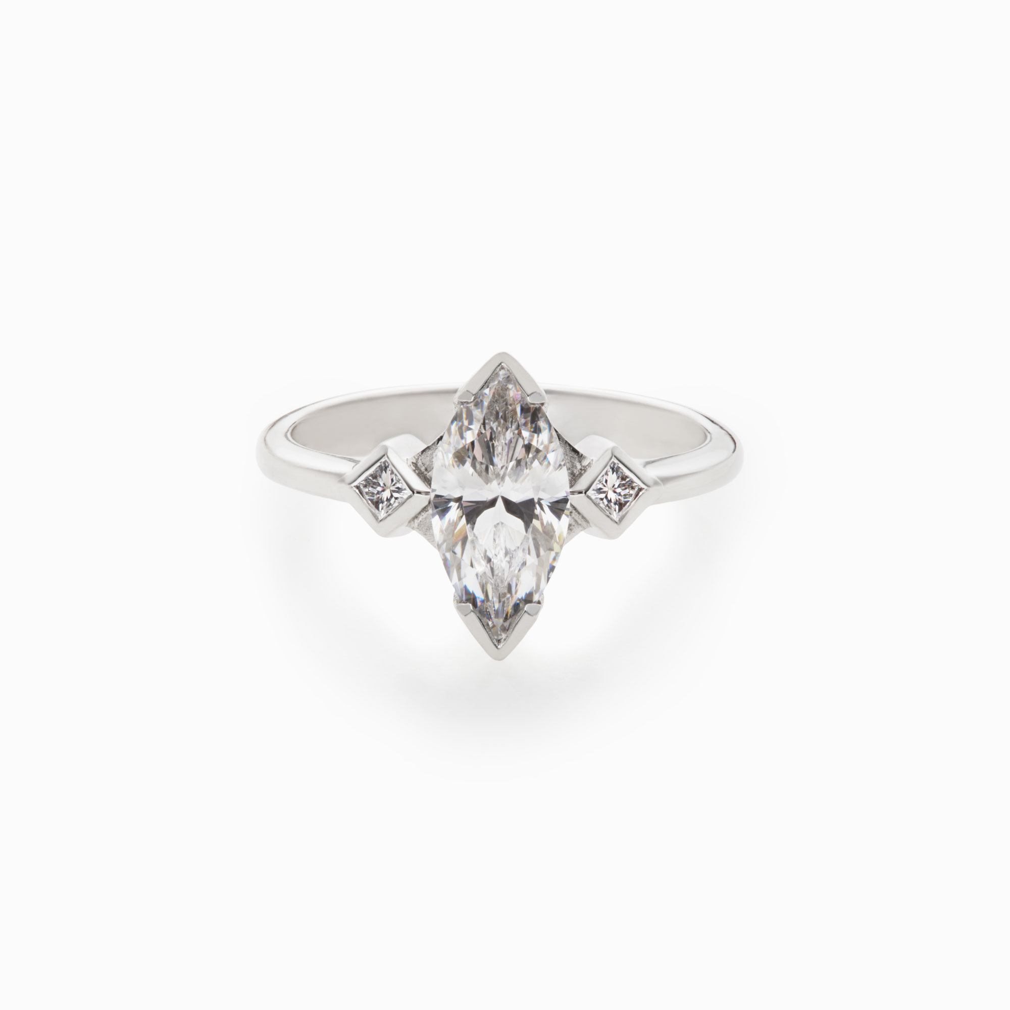 marquise diamond engagement ring with princess cut diamond accents