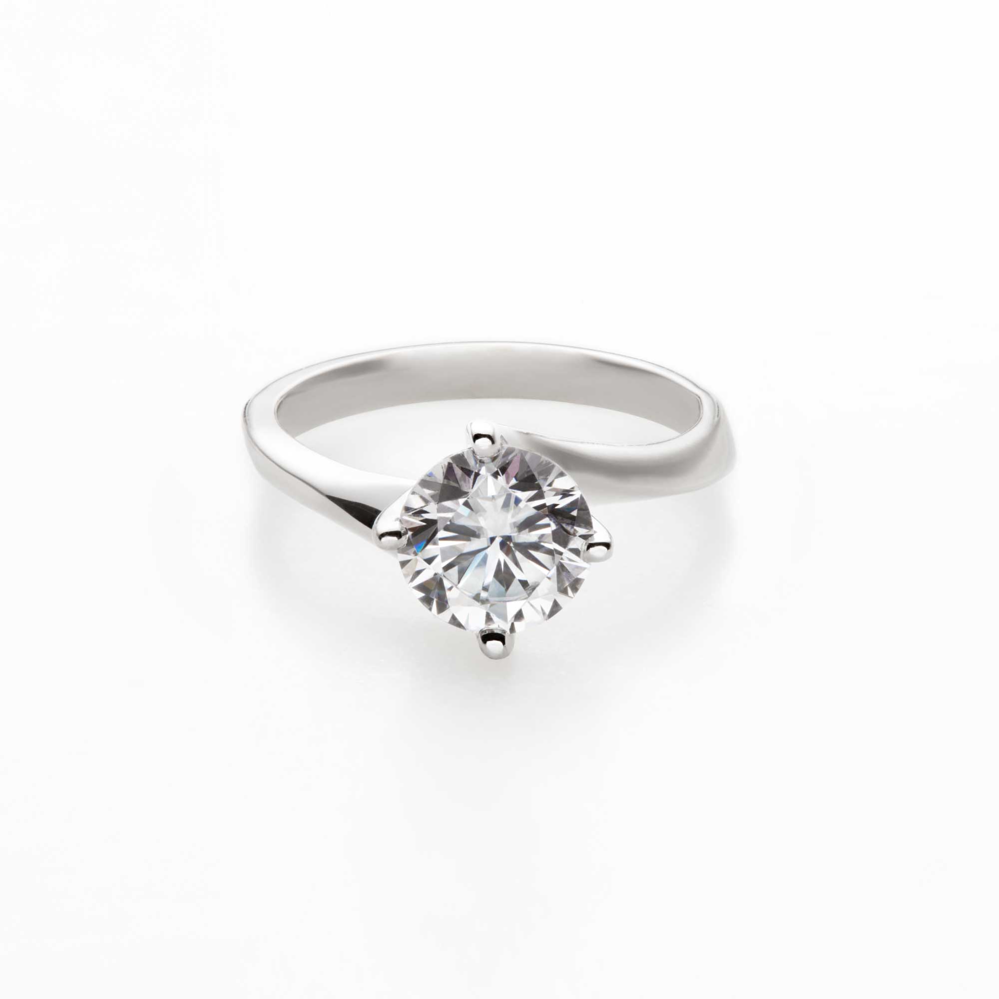 pulled taffy round diamond solitaire engagement ring