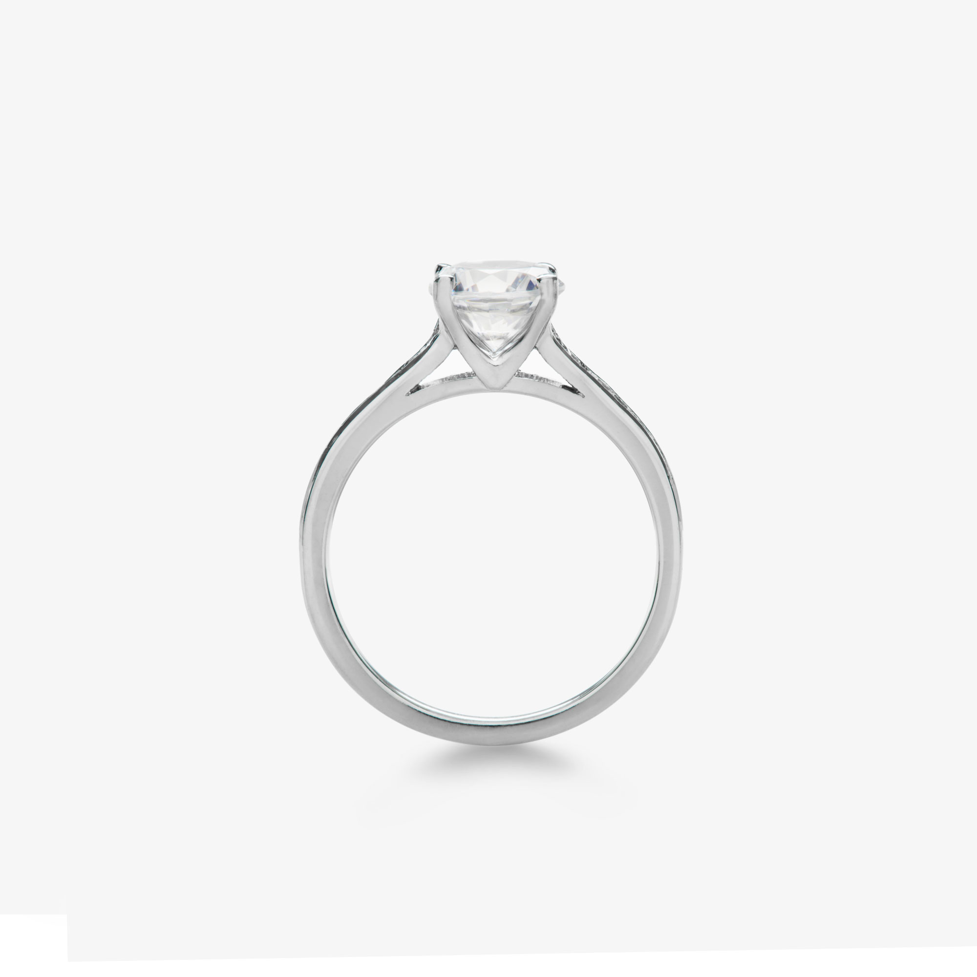 round brilliant diamond engagement ring with channel accents alt view