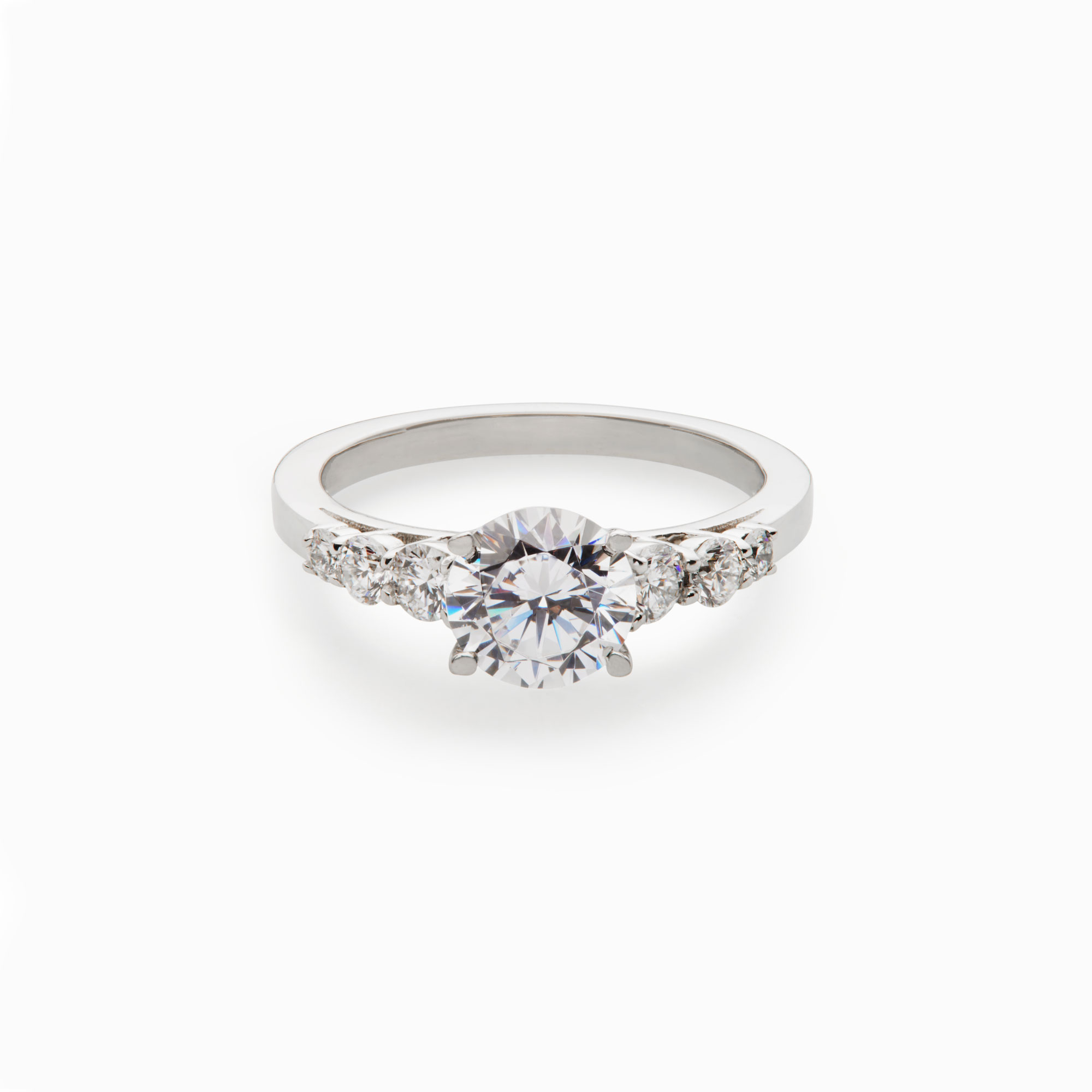 round brilliant diamond engagement ring with tapered round diamond accents