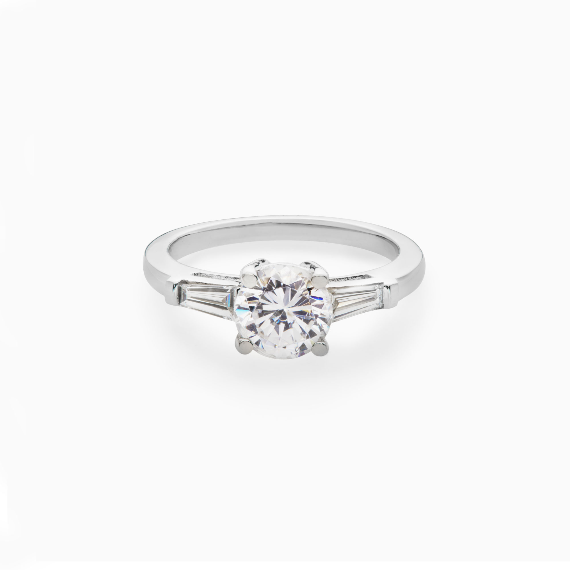 round brilliant diamond tapered baguette diamond engagement ring