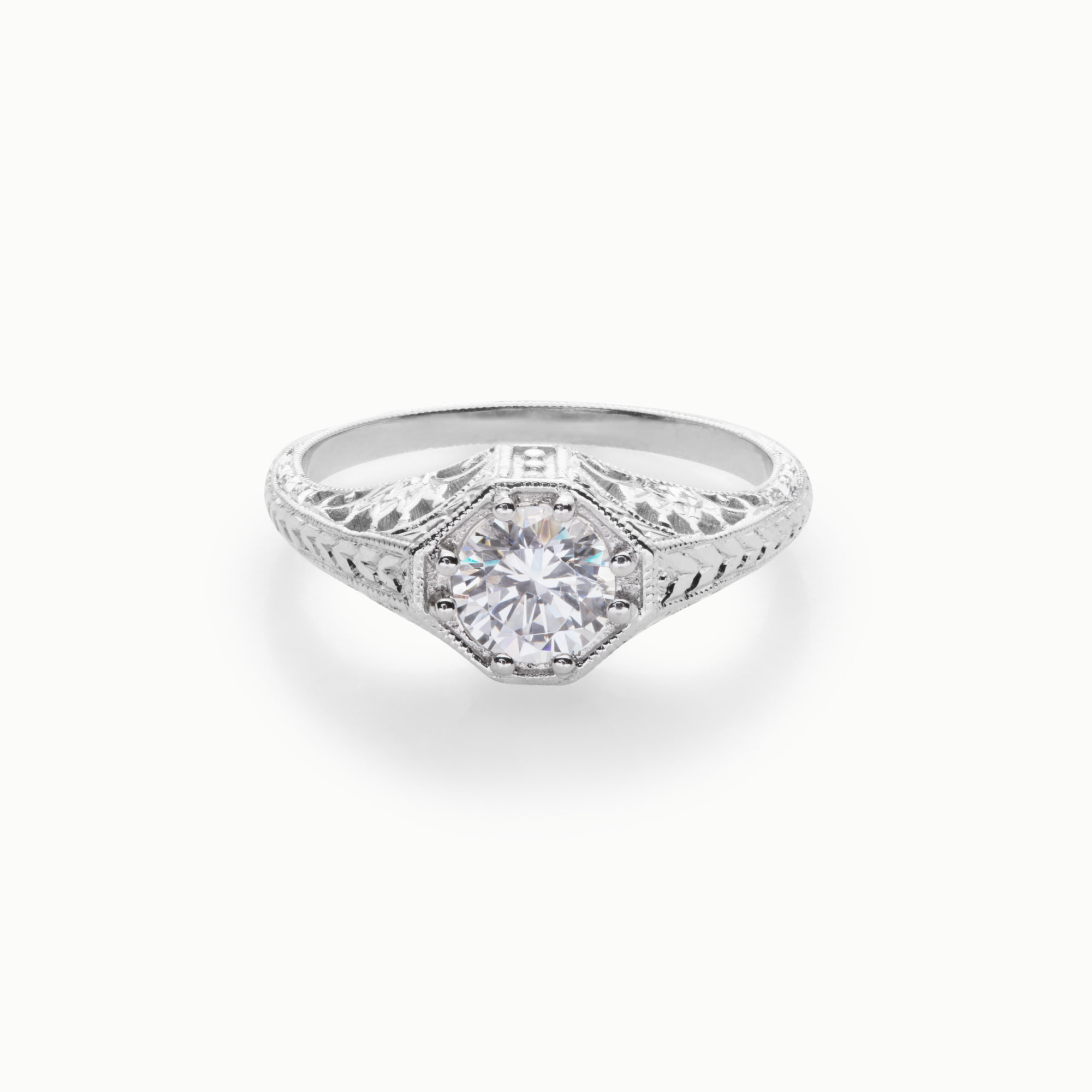 round brilliant diamond vintage style engagement ring with piercings