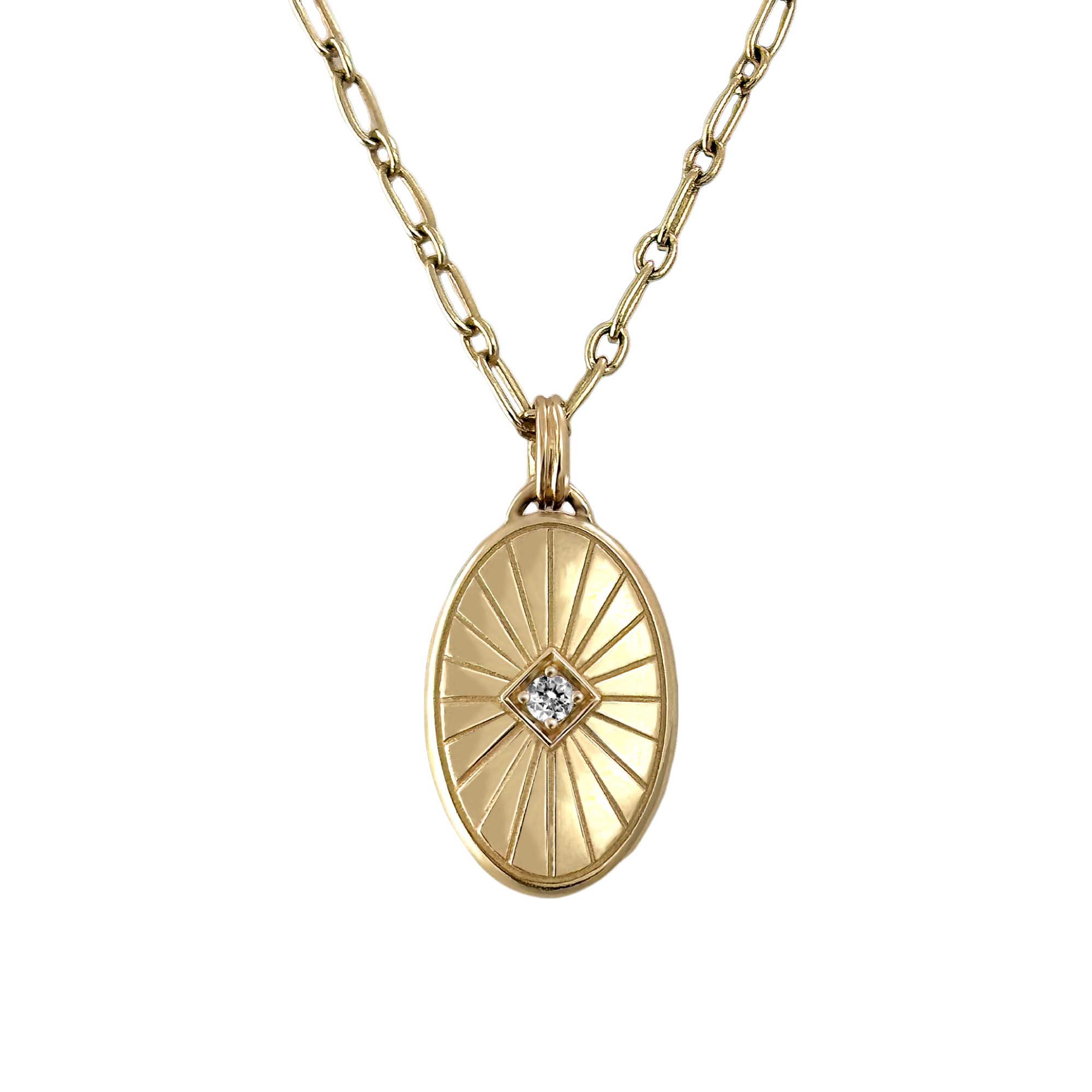 oval starburst locket yellow gold