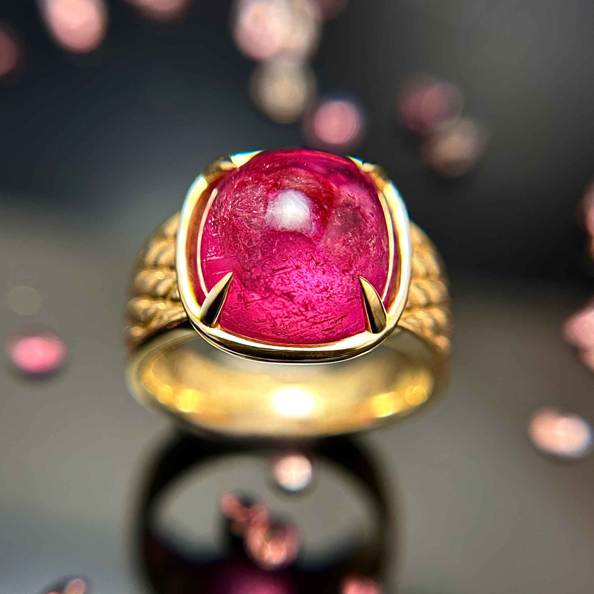 One Of A Kind Pink Tourmaline Cabochon Ring with Tuck and Roll Pattern