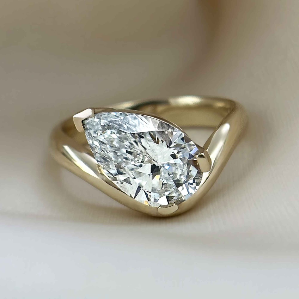 PEAR-CUT DIAMOND SOLITAIRE RING