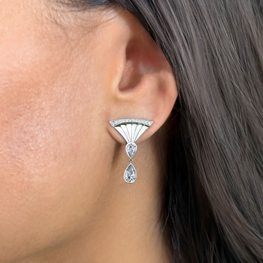 art deco white gold fan earrings with 2 diamond pears on ear