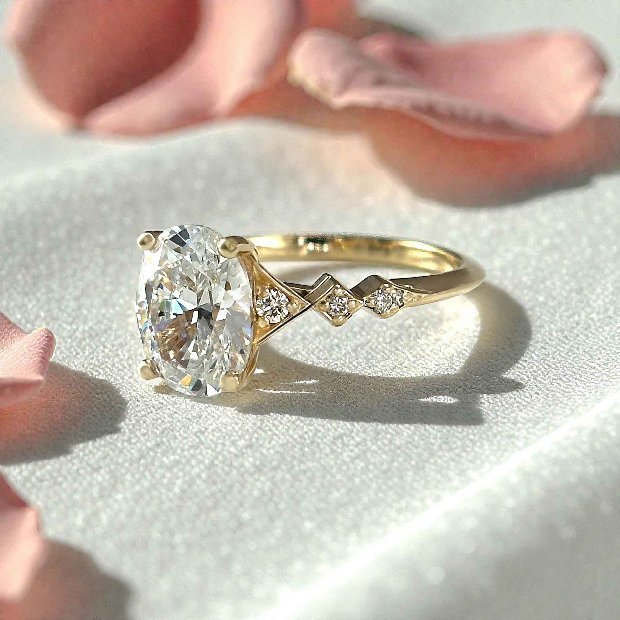 Oval Diamond Engagement Ring with Pavé-Set Diamond Accents in Harlequin Pattern Band