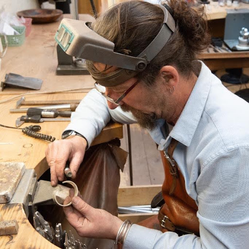 goldsmith-crafting-gold-band